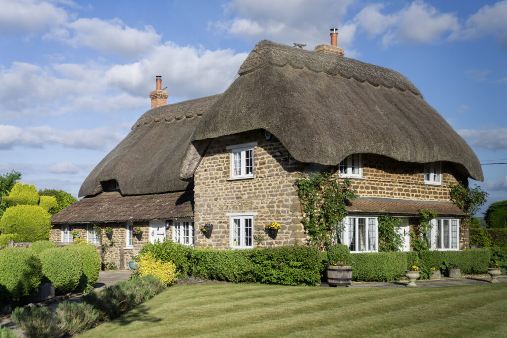 English Thatched Roof Cottage, Cotswolds, England